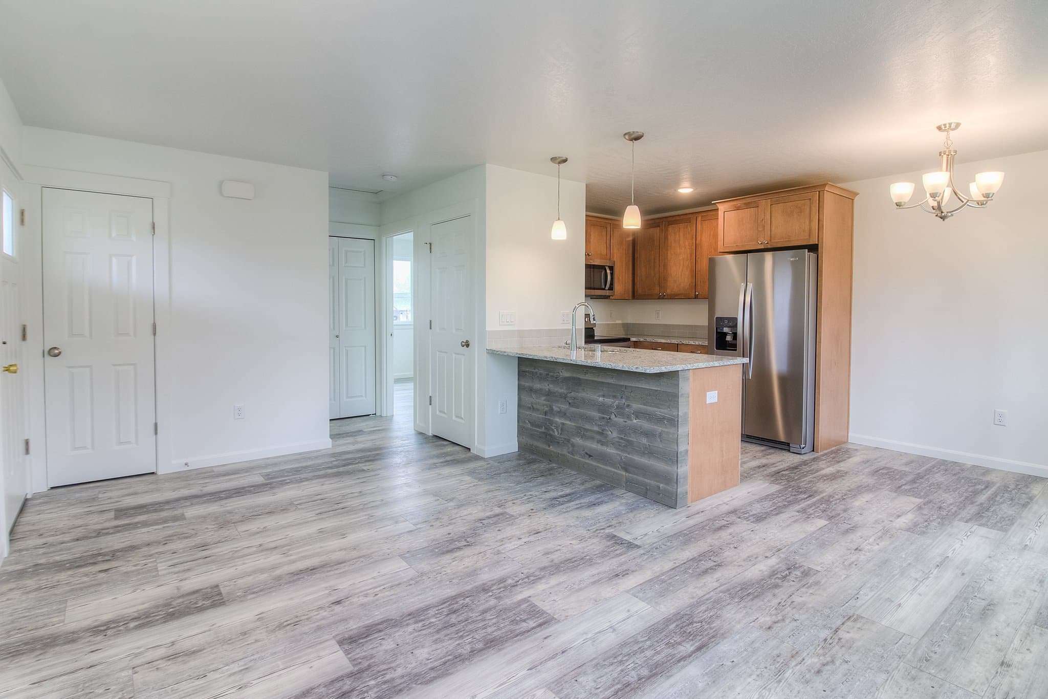 pebble tiny home modern farmhouse kitchen and living room