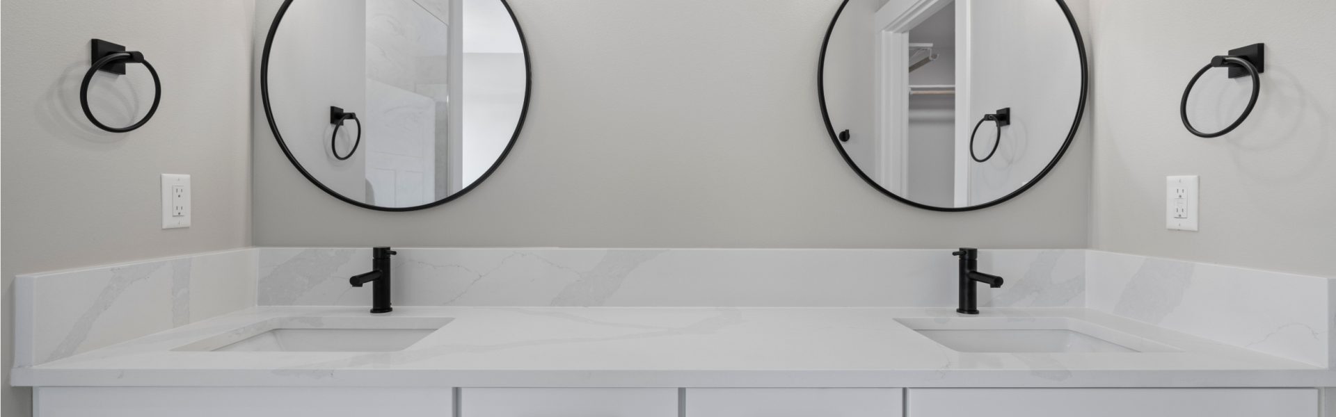 Double vanity bathroom sink with black hardware