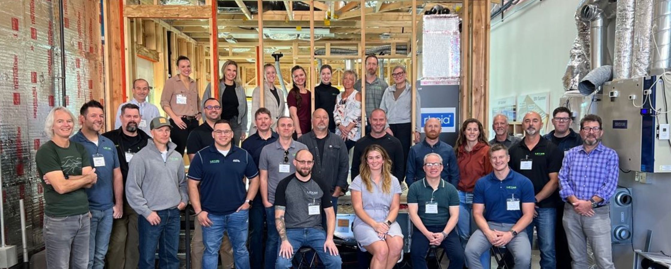 Large home building construction team photo