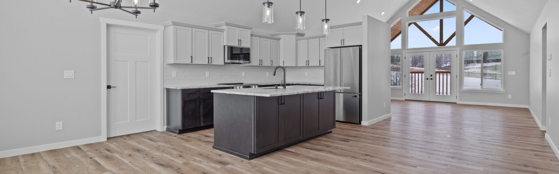 Modern Kitchen with Vaulted Ceilings in Custom Summit floor plan by Lexar Homes Spokane